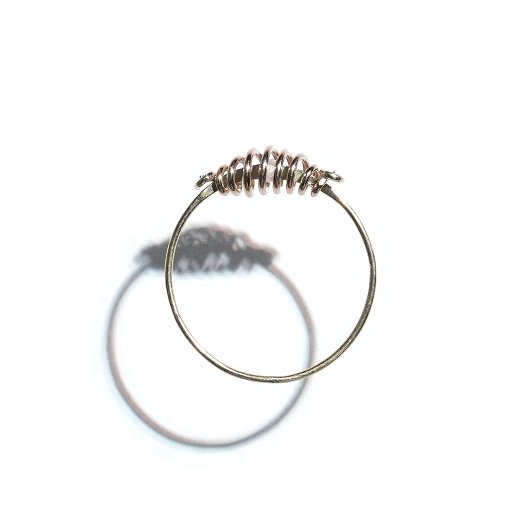 coil ring with dia meet akoya
