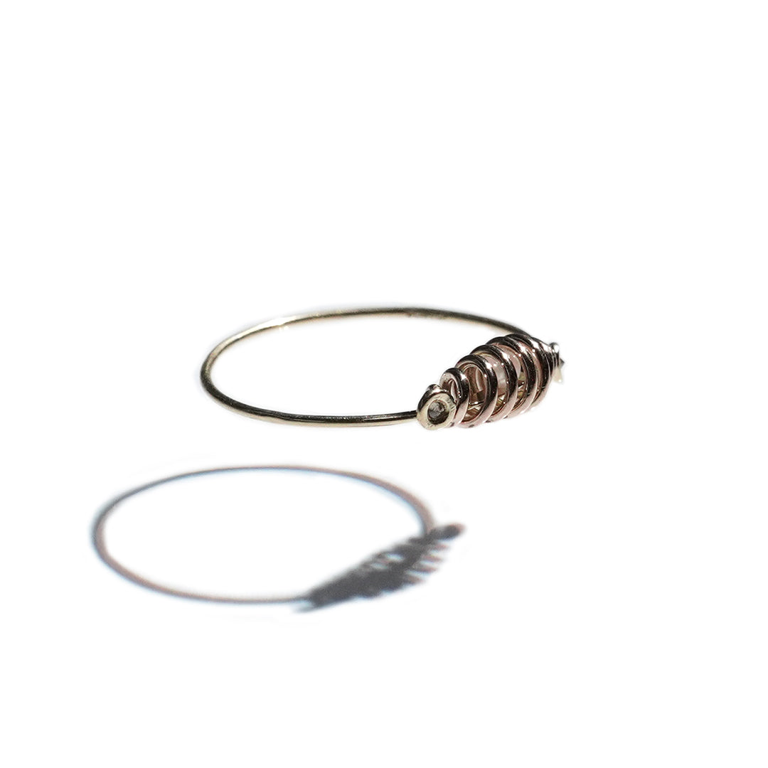 coil ring with dia meet akoya