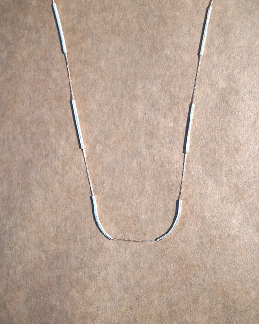 snake bene necklace